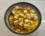 A picture of step 5 of Tofudon (tofu rice bowl).
