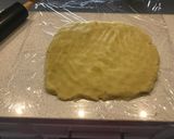 Foto del paso 5 de la receta: Arrollado de papa con jamón y queso