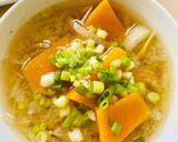 A picture of step 2 of Pumpkin Miso Soup with sweet onions.