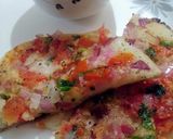 A picture of step 4 of Onion tomato rava Uttapam.
