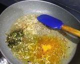 A picture of step 5 of Baingan bharta with spring onion.