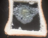 A picture of step 4 of Cheesy Egg Toast.