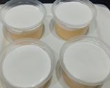 A picture of step 4 of Cream Custard shots with orange sauce.