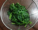 A picture of step 4 of Palak Chicken.