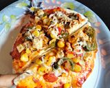 A picture of step 10 of Instant party pizza.