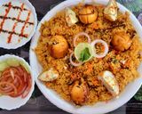 A picture of step 7 of Egg Biryani in Pressure Cooker.