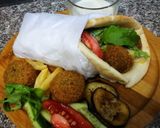 A picture of step 7 of Falafel sandwich||Falafel wrap.