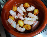 Foto del paso 12 de la receta: Cigalitas y ajos macerados en aceite de oliva confitados