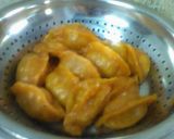 A picture of step 24 of Tomato egg momo.