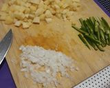 Foto del paso 1 de la receta: Papas con chorizo y rajas de chile serrano