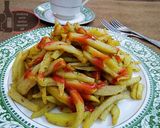 A picture of step 4 of Thelay walay french fries with illaichi wali chai.