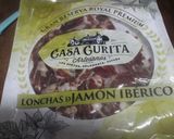 Foto del paso 2 de la receta Triángulos de pan de molde con jamón y queso