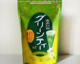 A picture of step 2 of Matcha Green Tea Sake.
