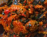 A picture of step 4 of Ettas native chicken stew with ugu leaf.