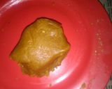 A picture of step 3 of Biscuits modak with tutifruti filling.