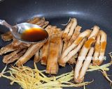 A picture of step 10 of Stir-Fried Tofu Skin with Oyster Sauce and Two Mushrooms.