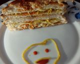 A picture of step 2 of Noodles cheese sandwich.