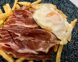 Foto del paso 5 de la receta: Huevos rotos con trufa negra y jamón ibérico