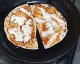 A picture of step 2 of Pita pizza.