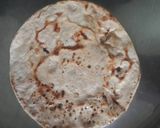 A picture of step 2 of Chapati pizza /thìn crust pizza.