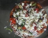 A picture of step 5 of Chapati pizza /thìn crust pizza.
