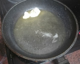 Foto del paso 4 de la receta: Contramuslos asados en freidora de aire con papas arrugas, piña y mojo verde