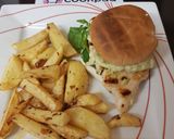 A picture of step 4 of My Grilled Chicken on Burger Buns with my secret sauce. 😁.