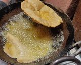 A picture of step 4 of Aligarh kachori with aloo sabji and raita.