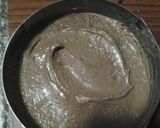 A picture of step 4 of Buttercream Cake with Blueberry Jam.