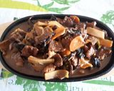 Une image de l'étape 5 de Veau aux champignons shiitakes frais sur plaque chauffante.