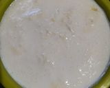A picture of step 1 of Coconut fritters deep in sugar syrup.