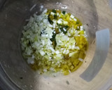 Foto del paso 1 de la receta: Huevos escalfados con verduras y arroz a la menta