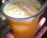A picture of step 3 of Peach sunshine slush.