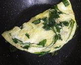 A picture of step 3 of Cheesy spinach omelette.