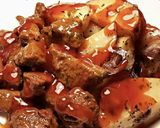 Foto del paso 19 de la receta Patatas orgánicas al horno con cebolla roja y pinchos morunos