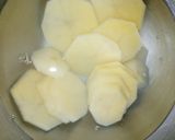 A picture of step 2 of Spicy Potato Slices.