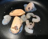 A picture of step 2 of Mussels Shrimps with Egg Sour Fried Rice Noodles.