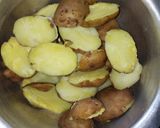 A picture of step 2 of Jacket potatoes #vegetablecontest.