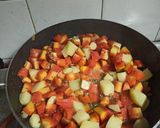 A picture of step 11 of Gajar Aloo Matar.