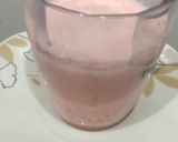 A picture of step 7 of Sago milk with Rooh afza syrup.