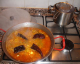Foto del paso 9 de la receta: Paella de gambones con calamares frescos y ajos tiernos