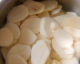 A picture of step 2 of Lyonnaise potatoes.