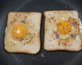 A picture of step 6 of Savoury Rosemary Flower Egg in a Hole.