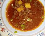 A picture of step 6 of Yummy qeema aloo gravy.