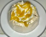 A picture of step 3 of Pavlova with berries and lemon curd.