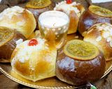 Foto del paso 12 de la receta: Roscón de reyes de naranja y chocolate