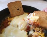 A picture of step 12 of Cheesy Shakshouka.