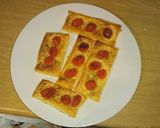 A picture of step 8 of Puff pastry tomato poppers.