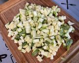 Une image de l'étape 2 de Riz gratiné aux deux fromages, courgette, persil et jambon.