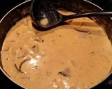 A picture of step 2 of Brad's pork and steamer clams in red Thai curry.